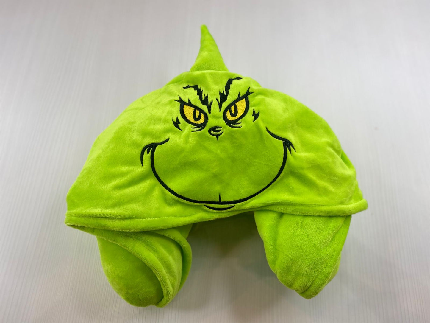 Almohada viajera Grinch